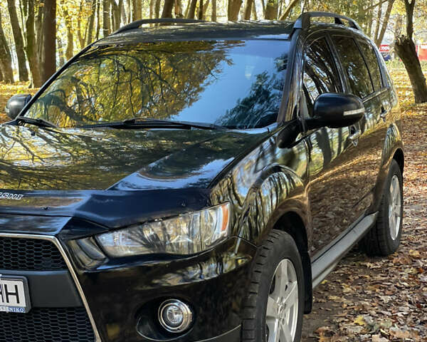 Міцубісі Аутлендер 2011 у Хмельницькому на Automoto.ua Чорний Міцубісі Аутлендер, об'ємом двигуна 2 л та пробігом 196 тис. км за 9500 $, фото 26 на Automoto.ua