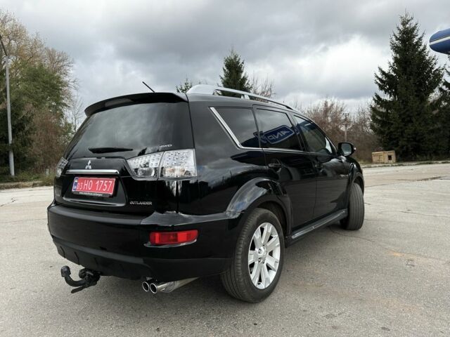 Черный Мицубиси Аутлендер, объемом двигателя 2.2 л и пробегом 237 тыс. км за 11450 $, фото 3 на Automoto.ua