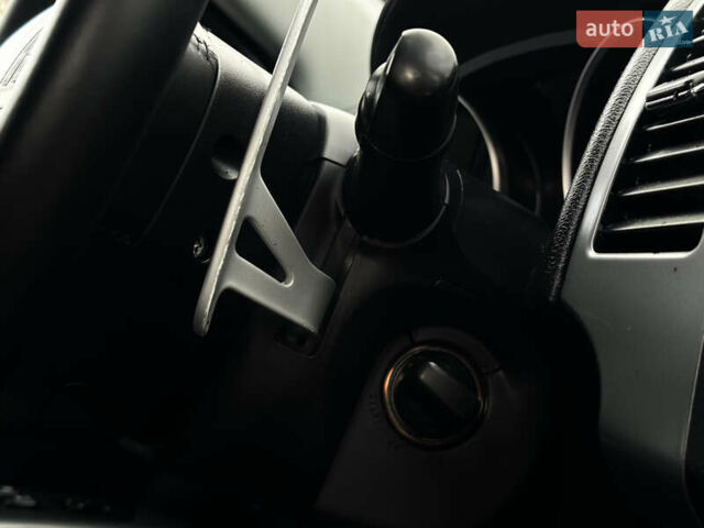 Міцубісі Аутлендер 2011 у Бердичеве на Automoto.ua Чорний Міцубісі Аутлендер, об'ємом двигуна 2.2 л та пробігом 237 тис. км за 11499 $, фото 49 на Automoto.ua