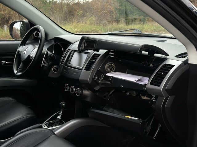 Черный Мицубиси Аутлендер, объемом двигателя 2.2 л и пробегом 237 тыс. км за 11450 $, фото 13 на Automoto.ua