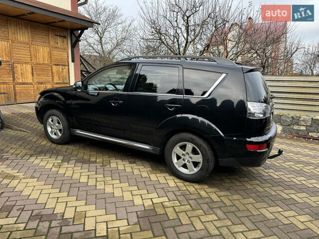 Чорний Міцубісі Аутлендер, об'ємом двигуна 2.2 л та пробігом 216 тис. км за 12000 $, фото 7 на Automoto.ua