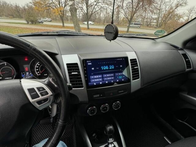 Черный Мицубиси Аутлендер, объемом двигателя 2.2 л и пробегом 253 тыс. км за 12500 $, фото 6 на Automoto.ua