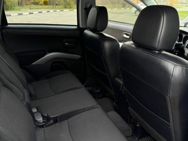 Черный Мицубиси Аутлендер, объемом двигателя 2.2 л и пробегом 253 тыс. км за 12500 $, фото 19 на Automoto.ua