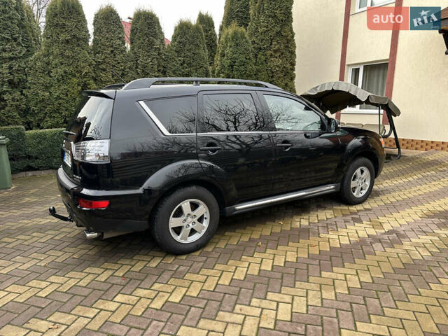 Чорний Міцубісі Аутлендер, об'ємом двигуна 2.2 л та пробігом 216 тис. км за 12000 $, фото 3 на Automoto.ua