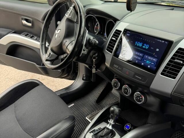 Черный Мицубиси Аутлендер, объемом двигателя 2.2 л и пробегом 253 тыс. км за 12500 $, фото 20 на Automoto.ua