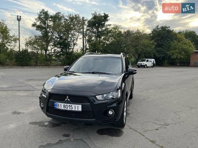 Чорний Міцубісі Аутлендер, об'ємом двигуна 2.4 л та пробігом 177 тис. км за 11900 $, фото 9 на Automoto.ua