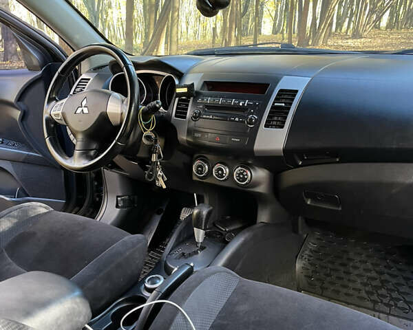 Міцубісі Аутлендер 2011 у Хмельницькому на Automoto.ua Чорний Міцубісі Аутлендер, об'ємом двигуна 2 л та пробігом 196 тис. км за 9500 $, фото 20 на Automoto.ua