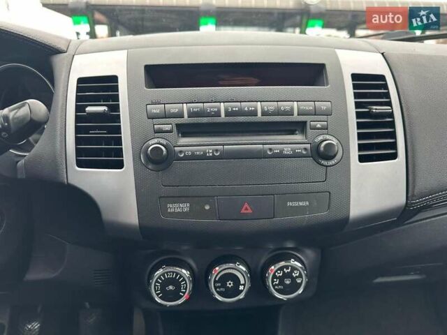 Черный Мицубиси Аутлендер, объемом двигателя 2.2 л и пробегом 226 тыс. км за 10750 $, фото 30 на Automoto.ua