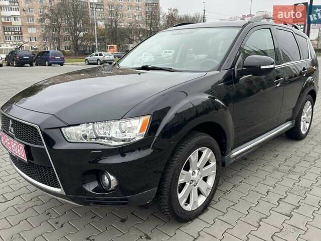 Черный Мицубиси Аутлендер, объемом двигателя 2.2 л и пробегом 226 тыс. км за 10750 $, фото 4 на Automoto.ua