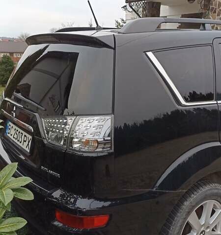 Черный Мицубиси Аутлендер, объемом двигателя 2 л и пробегом 196 тыс. км за 9900 $, фото 23 на Automoto.ua