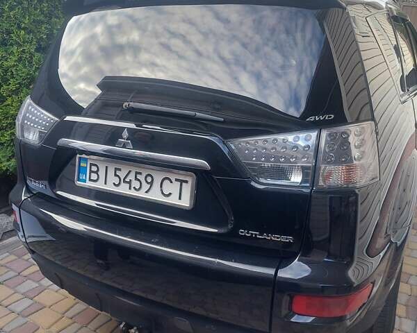 Чорний Міцубісі Аутлендер, об'ємом двигуна 2.3 л та пробігом 271 тис. км за 10500 $, фото 2 на Automoto.ua