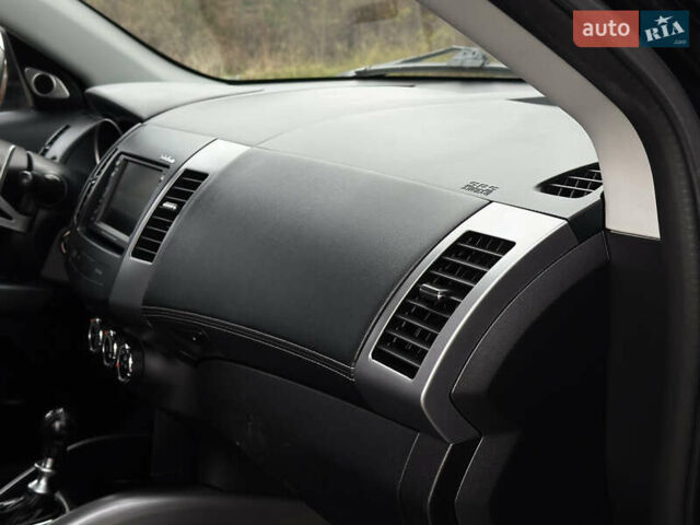 Чорний Міцубісі Аутлендер, об'ємом двигуна 2.2 л та пробігом 236 тис. км за 11399 $, фото 53 на Automoto.ua