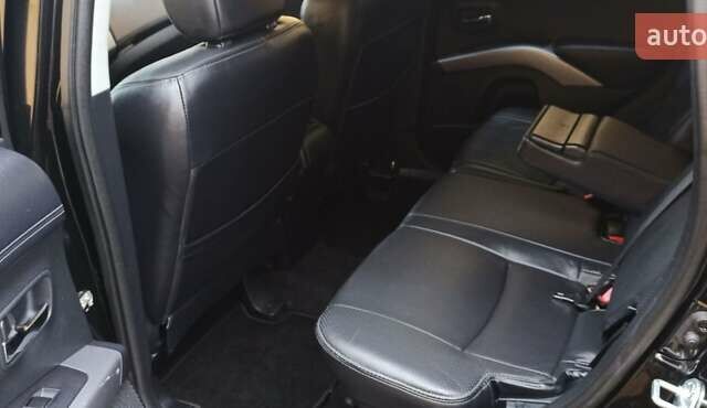 Черный Мицубиси Аутлендер, объемом двигателя 2.2 л и пробегом 209 тыс. км за 12700 $, фото 29 на Automoto.ua