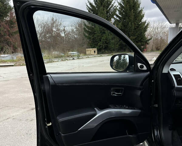 Чорний Міцубісі Аутлендер, об'ємом двигуна 2.2 л та пробігом 236 тис. км за 11399 $, фото 29 на Automoto.ua