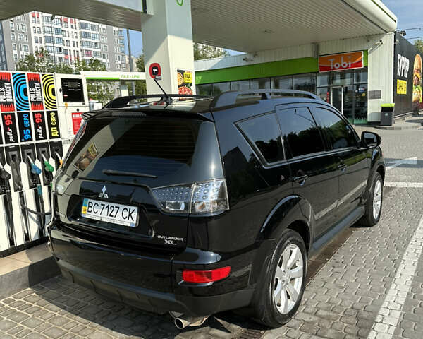 Міцубісі Аутлендер 2011 у Львові на Automoto.ua Чорний Міцубісі Аутлендер, об'ємом двигуна 2.36 л та пробігом 172 тис. км за 11000 $, фото 2 на Automoto.ua