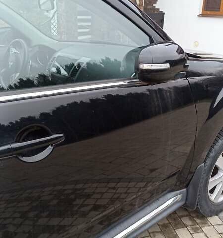 Черный Мицубиси Аутлендер, объемом двигателя 2 л и пробегом 196 тыс. км за 9900 $, фото 20 на Automoto.ua