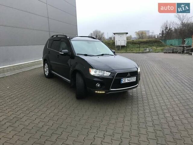Чорний Міцубісі Аутлендер, об'ємом двигуна 2.18 л та пробігом 295 тис. км за 10900 $, фото 1 на Automoto.ua