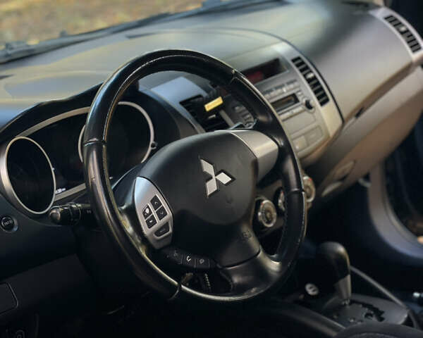 Міцубісі Аутлендер 2011 у Хмельницькому на Automoto.ua Чорний Міцубісі Аутлендер, об'ємом двигуна 2 л та пробігом 196 тис. км за 9500 $, фото 18 на Automoto.ua
