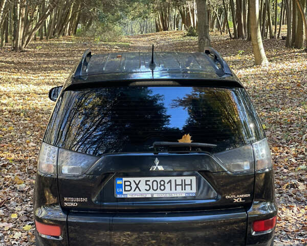 Міцубісі Аутлендер 2011 у Хмельницькому на Automoto.ua Чорний Міцубісі Аутлендер, об'ємом двигуна 2 л та пробігом 196 тис. км за 9500 $, фото 8 на Automoto.ua