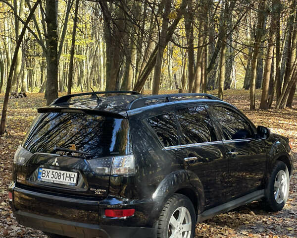 Міцубісі Аутлендер 2011 у Хмельницькому на Automoto.ua Чорний Міцубісі Аутлендер, об'ємом двигуна 2 л та пробігом 196 тис. км за 9500 $, фото 9 на Automoto.ua