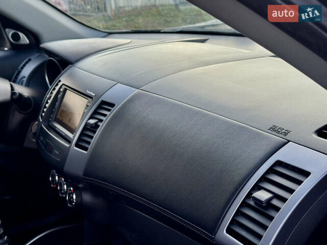 Мицубиси Аутлендер 2012 в Полтаве на Automoto.ua Черный Мицубиси Аутлендер, объемом двигателя 2.3 л и пробегом 194 тыс. км за 11450 $, фото 33 на Automoto.ua