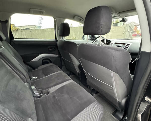 Чорний Міцубісі Аутлендер, об'ємом двигуна 2.36 л та пробігом 96 тис. км за 11700 $, фото 29 на Automoto.ua