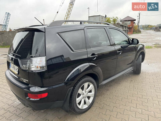 Чорний Міцубісі Аутлендер, об'ємом двигуна 2.36 л та пробігом 96 тис. км за 11700 $, фото 2 на Automoto.ua