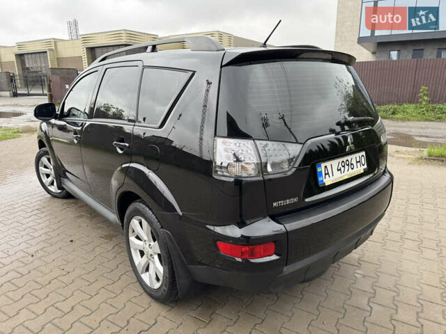 Чорний Міцубісі Аутлендер, об'ємом двигуна 2.36 л та пробігом 96 тис. км за 11700 $, фото 4 на Automoto.ua