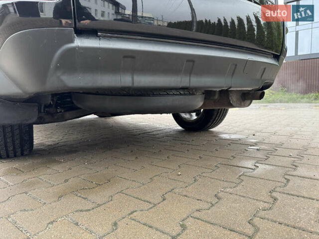 Чорний Міцубісі Аутлендер, об'ємом двигуна 2.36 л та пробігом 96 тис. км за 11700 $, фото 13 на Automoto.ua