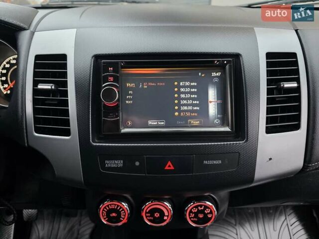 Черный Мицубиси Аутлендер, объемом двигателя 2.2 л и пробегом 188 тыс. км за 10999 $, фото 61 на Automoto.ua