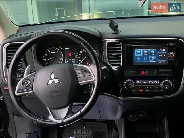 Черный Мицубиси Аутлендер, объемом двигателя 2.36 л и пробегом 212 тыс. км за 12990 $, фото 34 на Automoto.ua