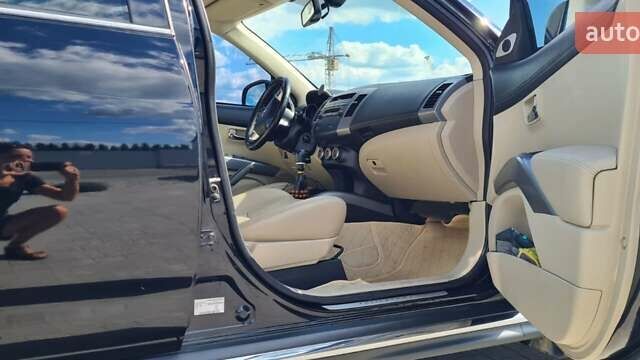 Черный Мицубиси Аутлендер, объемом двигателя 2.27 л и пробегом 195 тыс. км за 10500 $, фото 8 на Automoto.ua