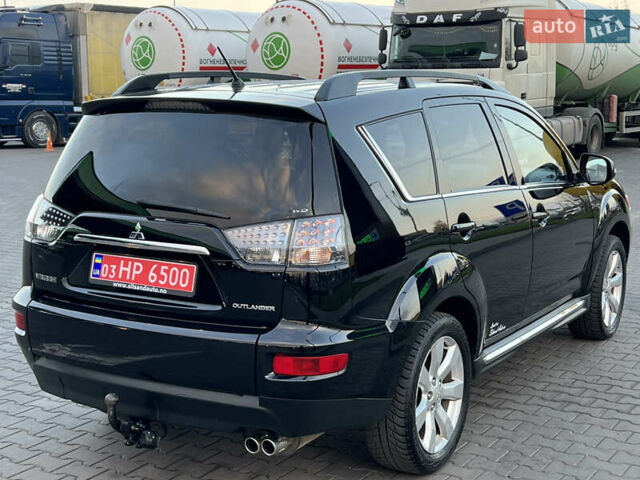 Чорний Міцубісі Аутлендер, об'ємом двигуна 2.3 л та пробігом 124 тис. км за 11999 $, фото 109 на Automoto.ua