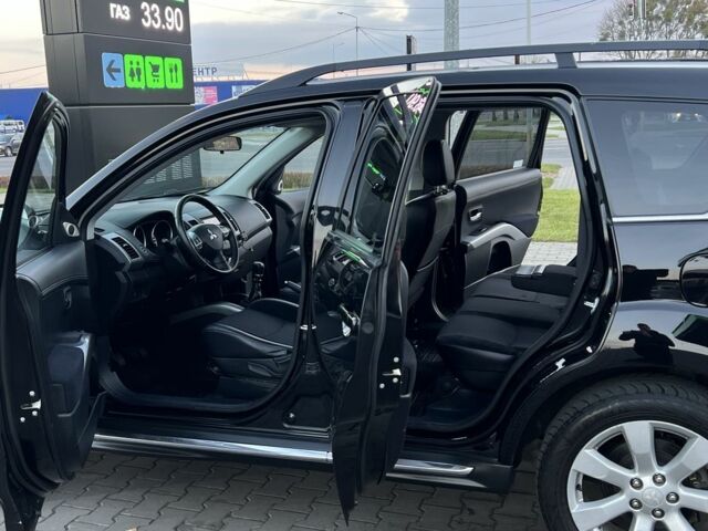 Черный Мицубиси Аутлендер, объемом двигателя 2.3 л и пробегом 124 тыс. км за 11999 $, фото 10 на Automoto.ua