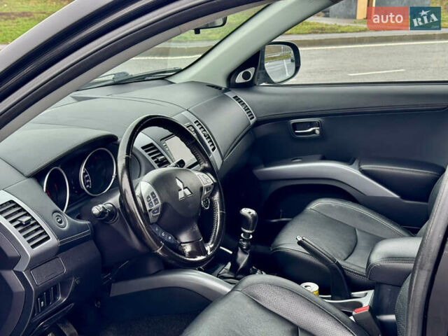 Черный Мицубиси Аутлендер, объемом двигателя 2.2 л и пробегом 215 тыс. км за 11450 $, фото 15 на Automoto.ua