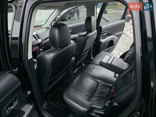 Черный Мицубиси Аутлендер, объемом двигателя 2.2 л и пробегом 188 тыс. км за 10999 $, фото 40 на Automoto.ua