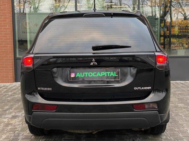 Черный Мицубиси Аутлендер, объемом двигателя 2.4 л и пробегом 212 тыс. км за 12990 $, фото 6 на Automoto.ua