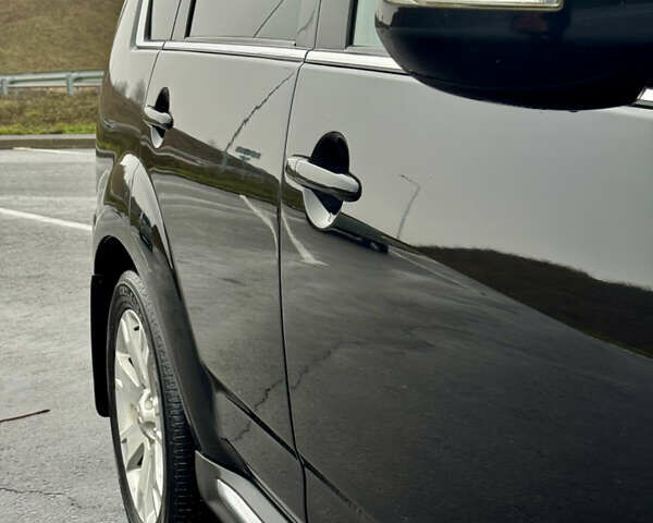 Черный Мицубиси Аутлендер, объемом двигателя 2.2 л и пробегом 215 тыс. км за 11450 $, фото 8 на Automoto.ua