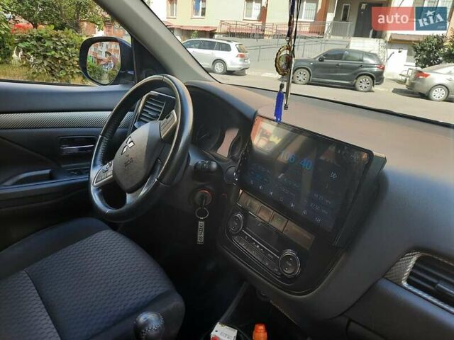 Черный Мицубиси Аутлендер, объемом двигателя 2.27 л и пробегом 256 тыс. км за 13600 $, фото 9 на Automoto.ua