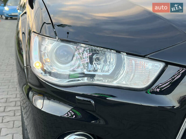 Чорний Міцубісі Аутлендер, об'ємом двигуна 2.3 л та пробігом 124 тис. км за 11999 $, фото 26 на Automoto.ua