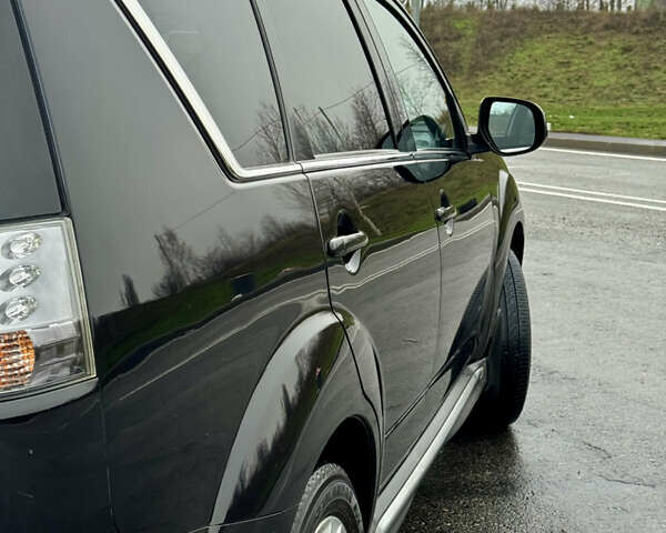 Черный Мицубиси Аутлендер, объемом двигателя 2.2 л и пробегом 215 тыс. км за 11450 $, фото 11 на Automoto.ua