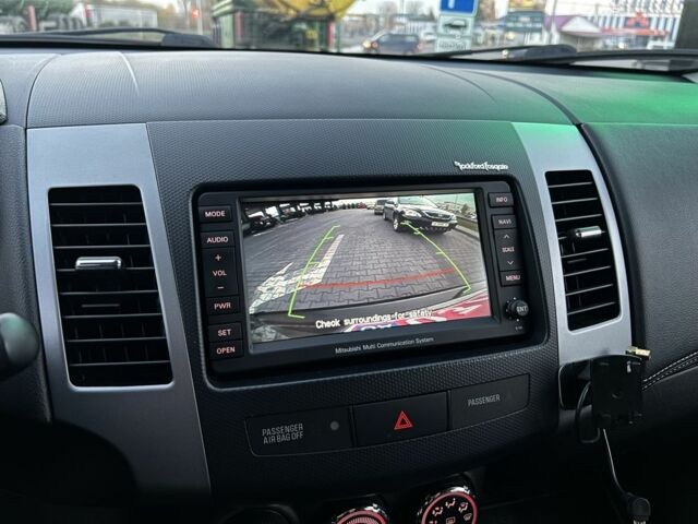 Черный Мицубиси Аутлендер, объемом двигателя 2.3 л и пробегом 124 тыс. км за 11999 $, фото 18 на Automoto.ua