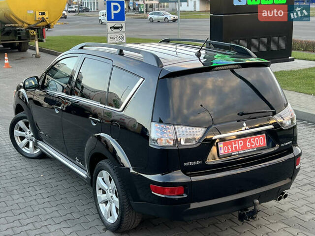 Чорний Міцубісі Аутлендер, об'ємом двигуна 2.3 л та пробігом 124 тис. км за 11999 $, фото 3 на Automoto.ua