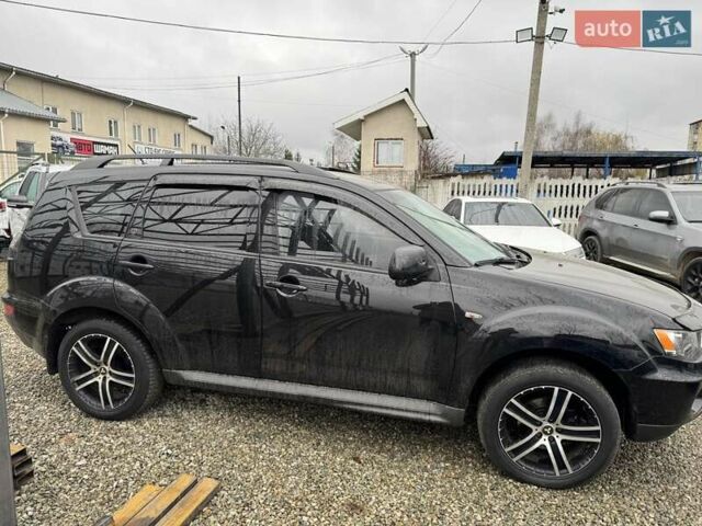 Чорний Міцубісі Аутлендер, об'ємом двигуна 2.36 л та пробігом 210 тис. км за 10500 $, фото 3 на Automoto.ua