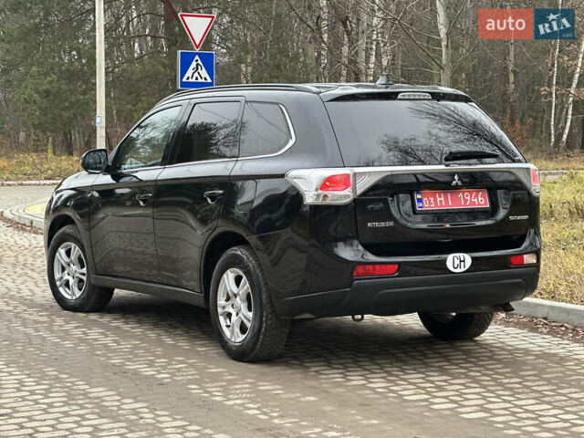 Чорний Міцубісі Аутлендер, об'ємом двигуна 2.2 л та пробігом 176 тис. км за 13500 $, фото 11 на Automoto.ua