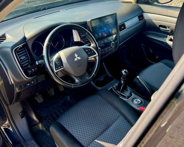 Чорний Міцубісі Аутлендер, об'ємом двигуна 2.27 л та пробігом 250 тис. км за 12200 $, фото 16 на Automoto.ua