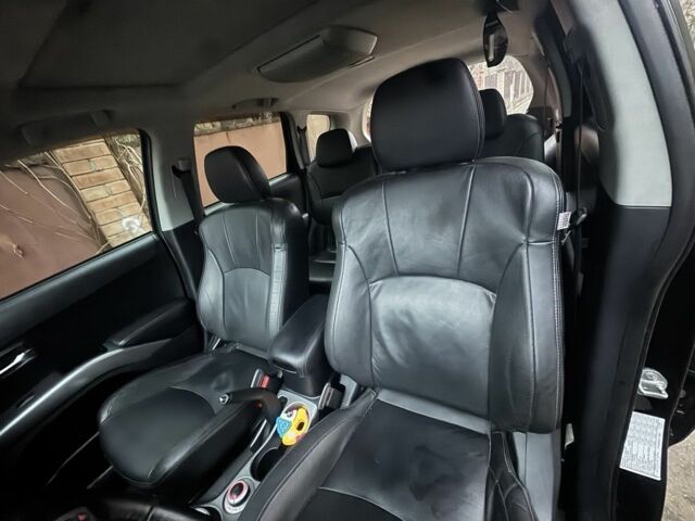 Черный Мицубиси Аутлендер, объемом двигателя 2.4 л и пробегом 136 тыс. км за 14500 $, фото 5 на Automoto.ua