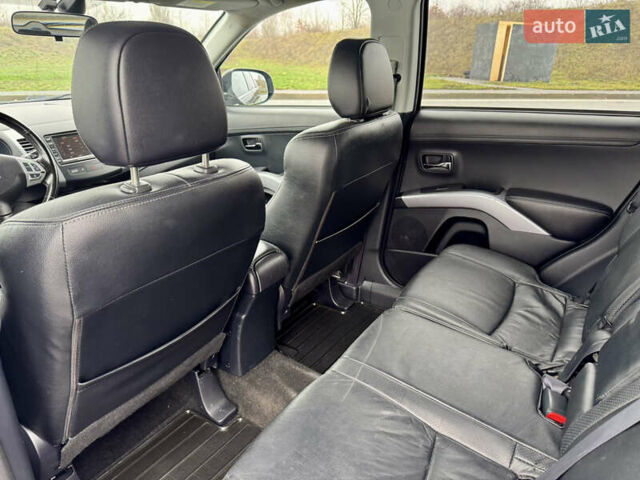 Черный Мицубиси Аутлендер, объемом двигателя 2.2 л и пробегом 215 тыс. км за 11450 $, фото 25 на Automoto.ua