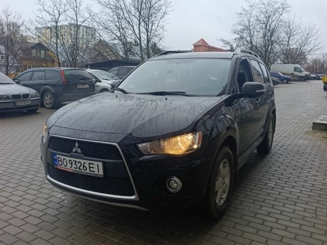 Черный Мицубиси Аутлендер, объемом двигателя 2 л и пробегом 235 тыс. км за 10300 $, фото 6 на Automoto.ua