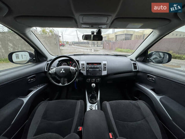 Чорний Міцубісі Аутлендер, об'ємом двигуна 2.36 л та пробігом 96 тис. км за 11700 $, фото 31 на Automoto.ua